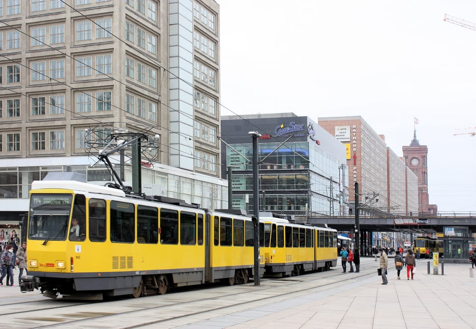 Alexanderplatz in Berlin with tram tracks and the Red City Hall in view.
